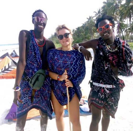 TribeX guests with local Zanzibari hosts during a village visit